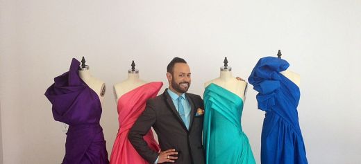 Enchants Hollywood with his gowns